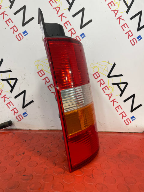 Volkswagen Transporter T5 PASSENGER SIDE REAR TAIL LIGHT (CRACKED PLEASE SEE PHOTOS) 2009-2015 P/N 7H0945095F