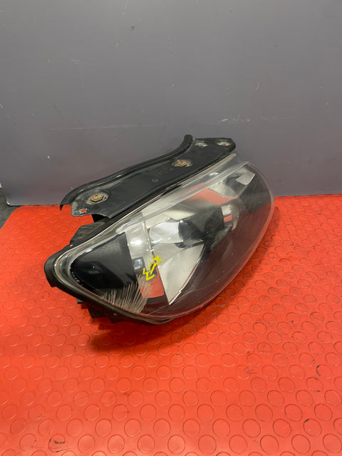 Volkswagen Caddy HEADLIGHT ASSEMBLY Driver's Side (with Scratches please see photos & 1 bulb missing) P/N TYC2012473152